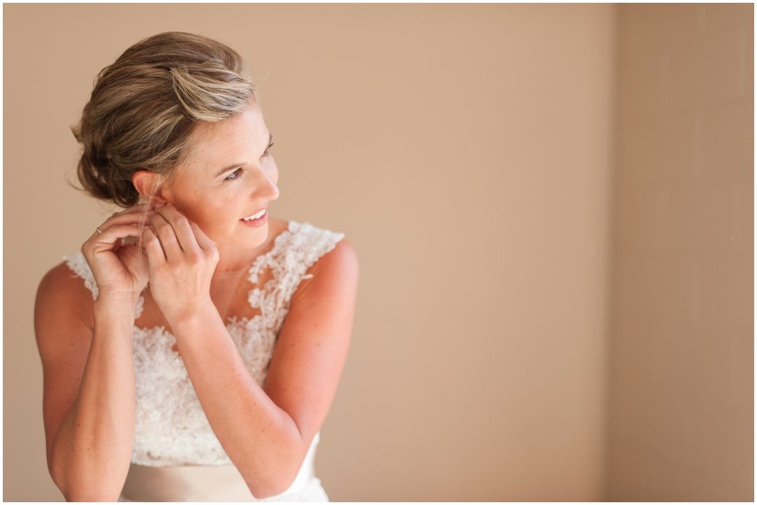 First Baptist Church Jackson TN Wedding putting in earings