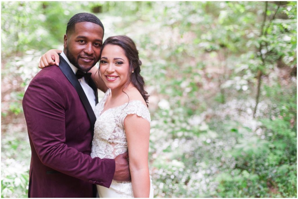 Outdoor Spring Wedding groom holding bride