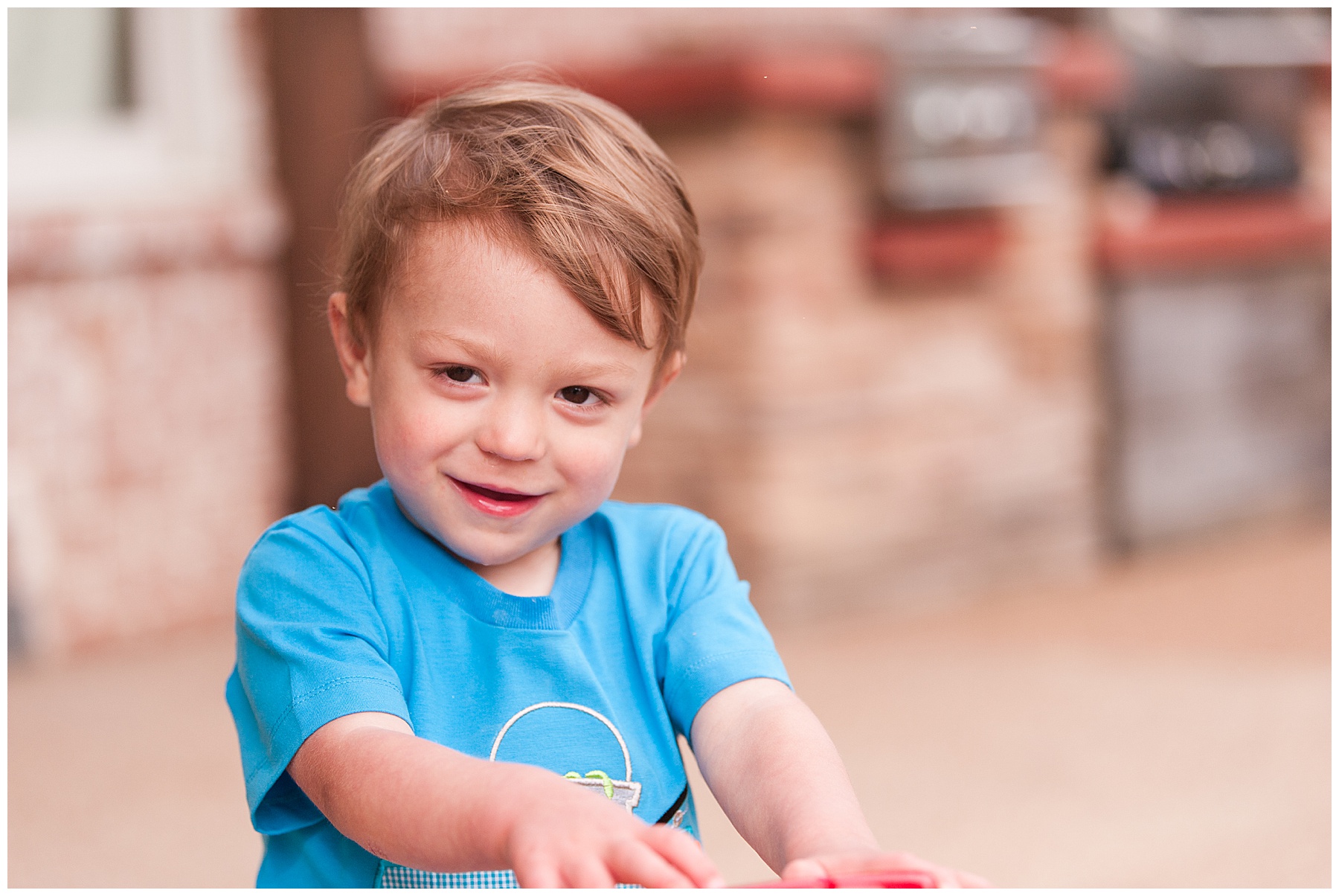 two year old in blue shirt